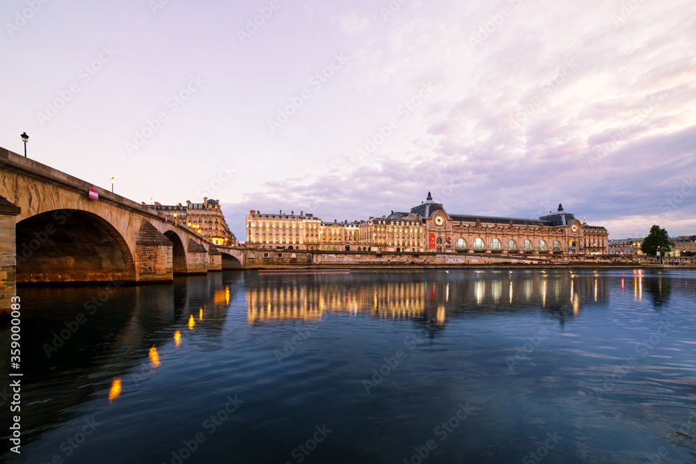 Sunset view of Orsay Museum located on the left bank of the Seine river, Paris, France