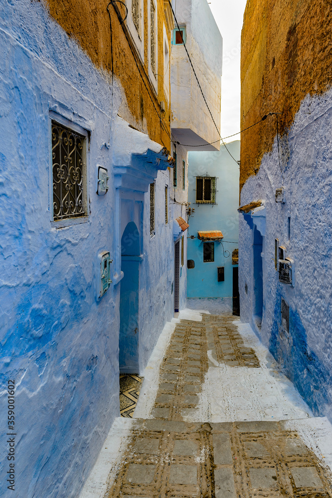 It's Blue wall of Chefchaouen, small town in northwest Morocco famous by its blue buildings It's Blue wall of Chefchaouen, small town in northwest Morocco famous by its blue buildings