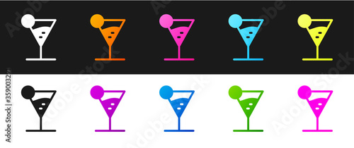Set Martini glass icon isolated on black and white background. Cocktail icon. Wine glass icon. Vector Illustration.