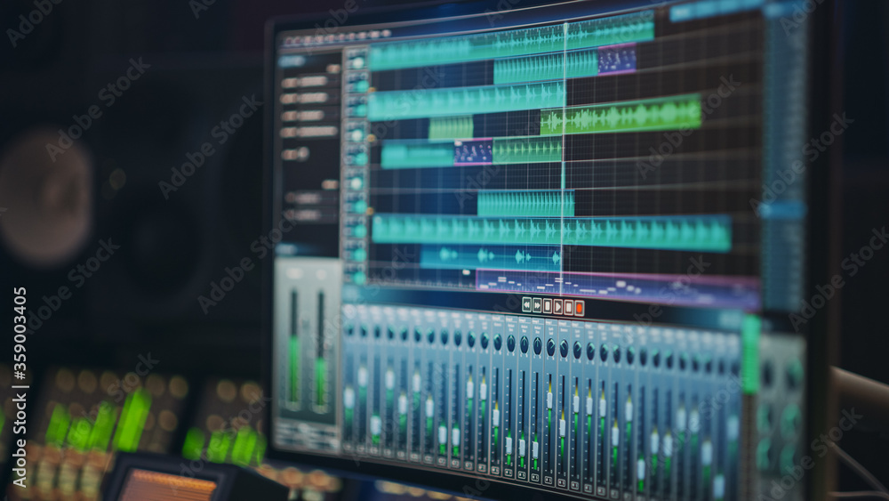 Modern Music Recording Studio Equipment: Computer Screen Showing User Interface of DAW Digital Audio Workstation Software with Track Song Playing. Sound and Music Recording and Editing Application