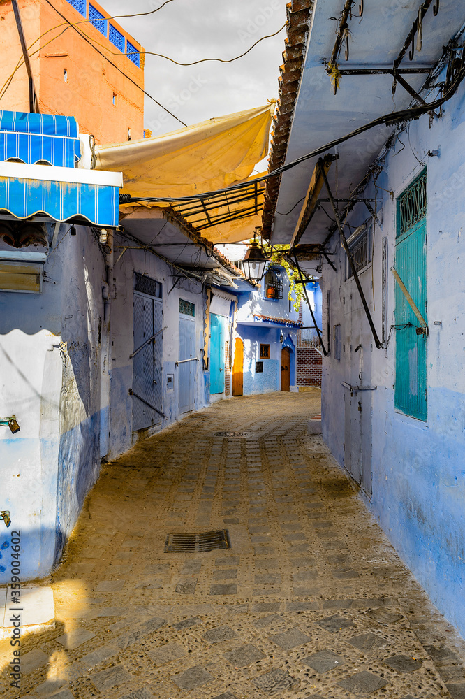It's Blue painted walls of the houses in Chefchaouen, small town in northwest Morocco famous by its blue buildings It's Blue painted walls of the houses in Chefchaouen, small town in northwest Morocco famous by its blue buildings