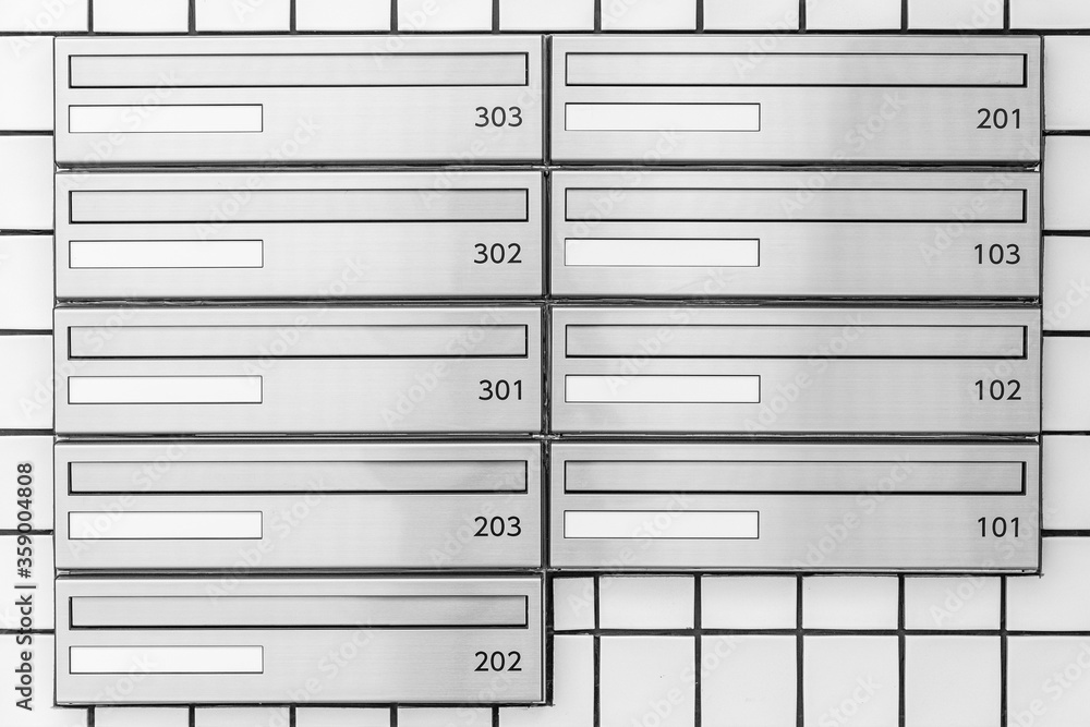 Close - up Modern metal mailboxes in an apartment building Close - up Modern metal mailboxes in an apartment building