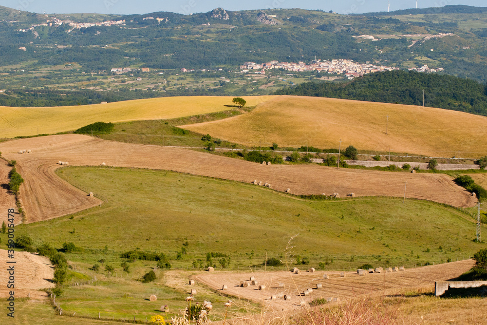 landscape with cultivated fields on the hills of Conza della Campania and Cairano. Campania, Irpinia, Avellino, Italy. landscape with cultivated fields on the hills of Conza della Campania and Cairano. Campania, Irpinia, Avellino, Italy.