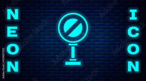 Glowing neon Stop sign icon isolated on brick wall background. Traffic regulatory warning stop symbol. Vector Illustration.