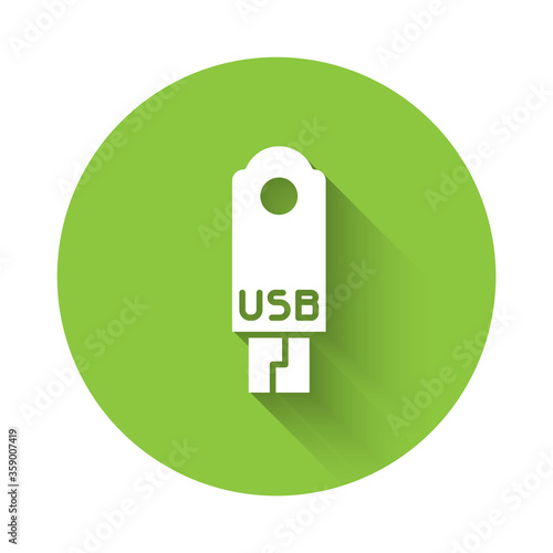 White USB flash drive icon isolated with long shadow. Green circle button. Vector Illustration.