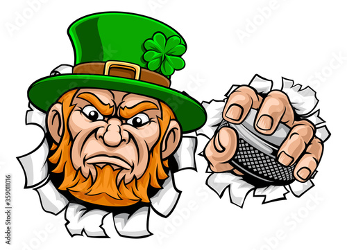 A leprechaun ice hockey sports mascot cartoon character holding a puck