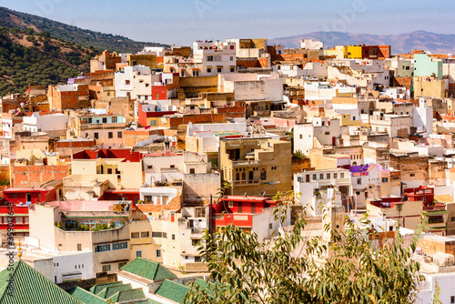 Fototapeta Naklejka Na Ścianę i Meble -  It's Aerial view of Moulay Idriss, the holy town in Morocco, named after Moulay Idriss I arrived in 789 bringing the religion of Islam