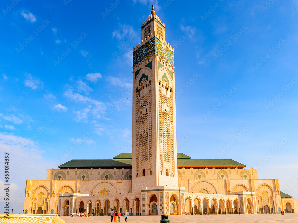 It's Hassan II Mosque or Grande Mosquee Hassan II, a mosque in Casablanca, Morocco. It is the largest mosque in Morocco and the 13th largest in the world.