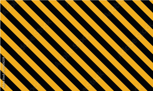 fond ou bannière lignes diagonales noir et jaune représentant un danger ou limite photo
