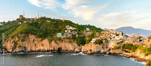 The rock La Quebrada, one of the most famous tourist attractions in Acapulco, Mexico. photo