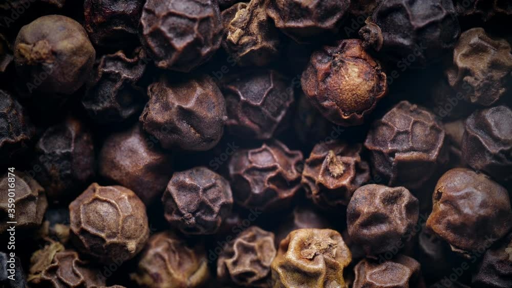 Black peppercorn background. Slow rotation. Black peppercorn background. Slow rotation.