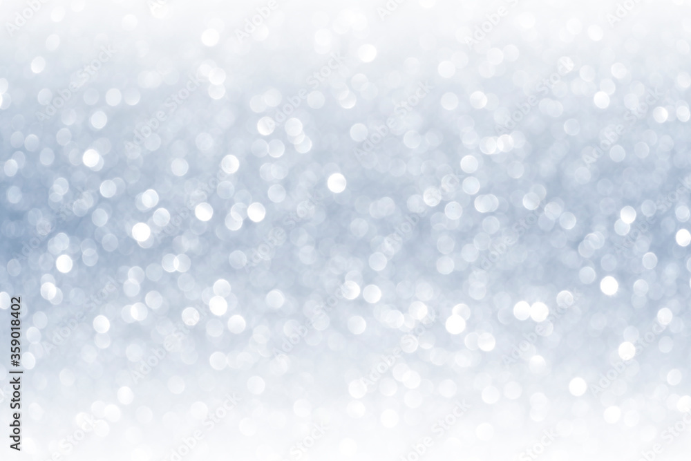 Abstract blurred fancy silver and white glitter sparkle confetti with gradient light reflect for background usage Abstract blurred fancy silver and white glitter sparkle confetti with gradient light reflect for background usage