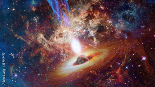 Bright quasar in deep space. Elements of this image furnished by NASA