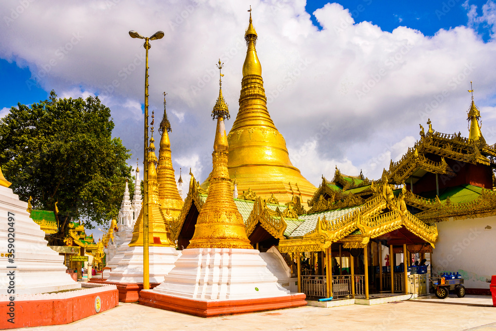Naklejka premium It's Surroundings of the Shwedagon Pagoda, a gilded stupa on the Singuttara Hill, Kandawgyi Lake, Yangon, Myanmar