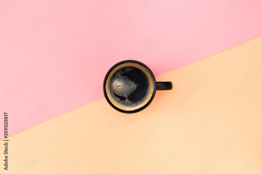 Coffee mug on a bright background with a diagonal. With copy space
