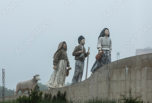 Fatima, Portugal, June 12, 2018: Children from Fatima, a small architectural monument on one of the roundabouts in Fatima.