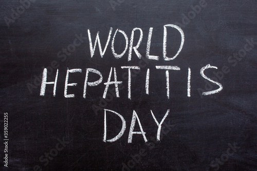 World Hepatitis day text on a chalkboard