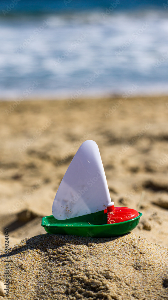 beach boat toy on the beach