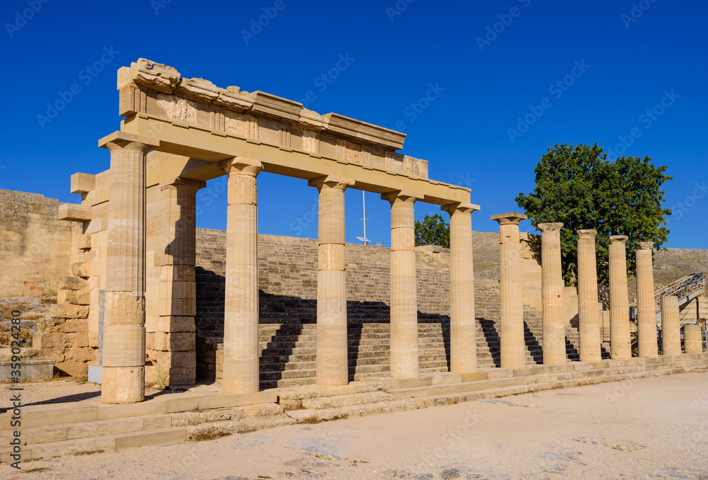 Obraz premium Sightseeing of Rhodes island. Ruins of ancient temple in Lindos, Rhodes island, Greece.