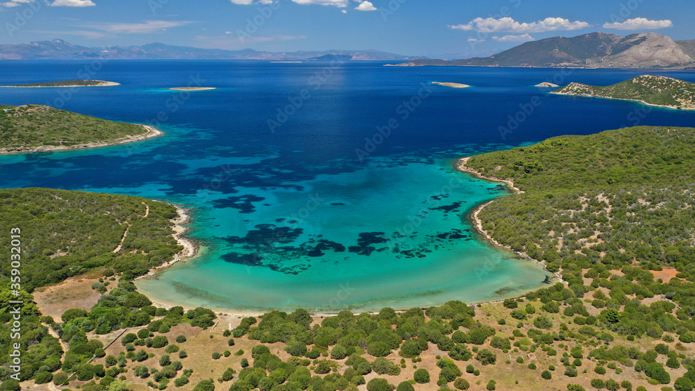 Aerial drone photo of beautiful paradise island turquoise sandy beach in Chersonisi in complex of Petalioi that form a blue lagoon in South Evoia island near Marmari, Greece