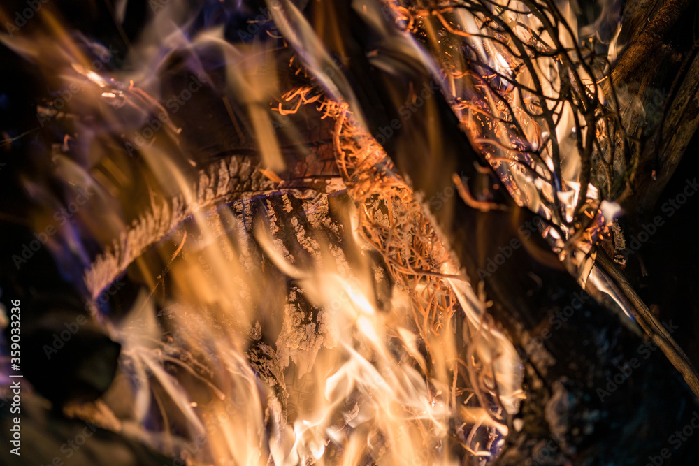 Burning coals from a fire abstract background