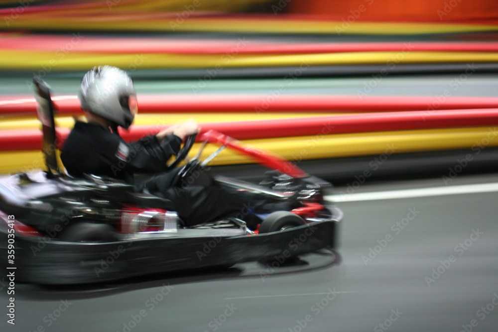 Cards rides at high speed on karting