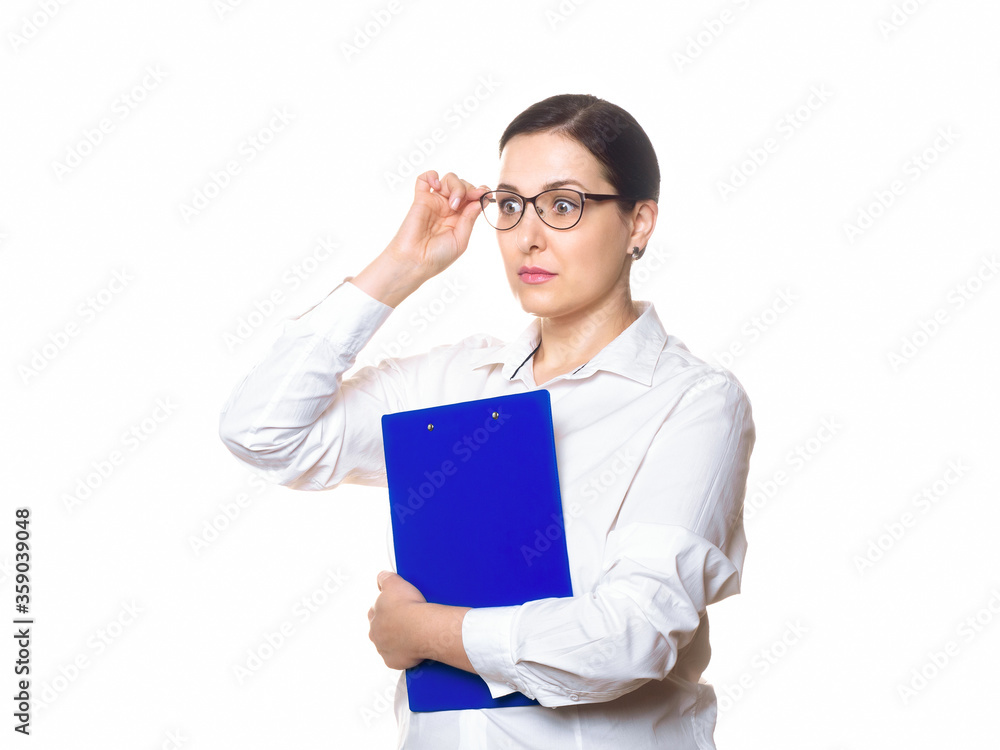 Wondering female face. Caucasian woman in formal shirt looks at something with surprise through her glasses, isolated on white. Wondering female face. Caucasian woman in formal shirt looks at something with surprise through her glasses, isolated on white.