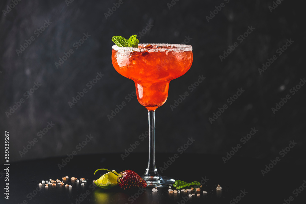 Ταπετσαρία Frozen strawberry lime mint margarita in tall footed glass on the dark background
