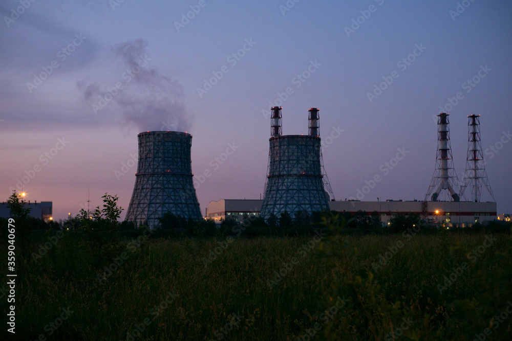 power station at night and smoke