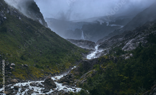Dramatic Moody View of the River coming from Buerbreen Glacier Down the Valley, Odda, Norway