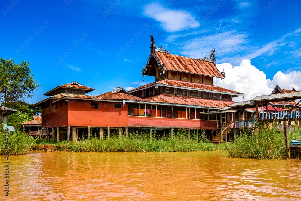 Fototapeta premium It's Beautiful view of the Inpawkhon village over the Inle Sap,a freshwater lake in the Nyaungshwe Township of Taunggyi District of Shan State, Myanmar