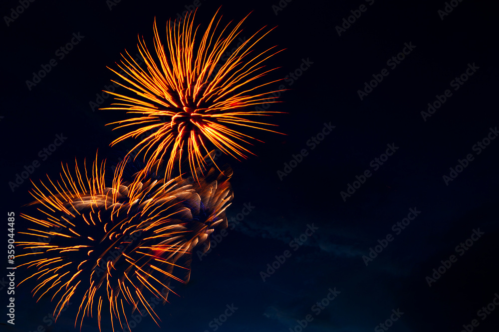 4th July fireworks. Fireworks display on dark sky background 4th July fireworks. Fireworks display on dark sky background
