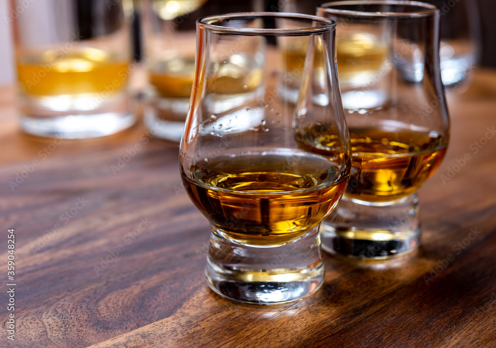 Scotch single malt or blended whisky tasting on distillery in Scotland, UK Scotch single malt or blended whisky tasting on distillery in Scotland, UK