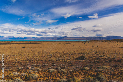 field lake sky and mountains