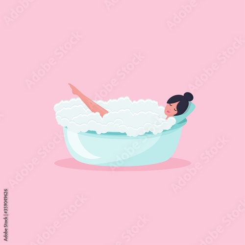 Smiling woman in the bubble bath, girl relaxing lying in the foam tub