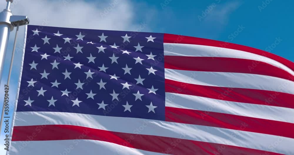 Independence Day in the United States is a federal holiday on July 4. USA flag on flagpole with running clouds high definition. American Flag in Slow Motion. Independence Day in the United States is a federal holiday on July 4. USA flag on flagpole with running clouds high definition. American Flag in Slow Motion.