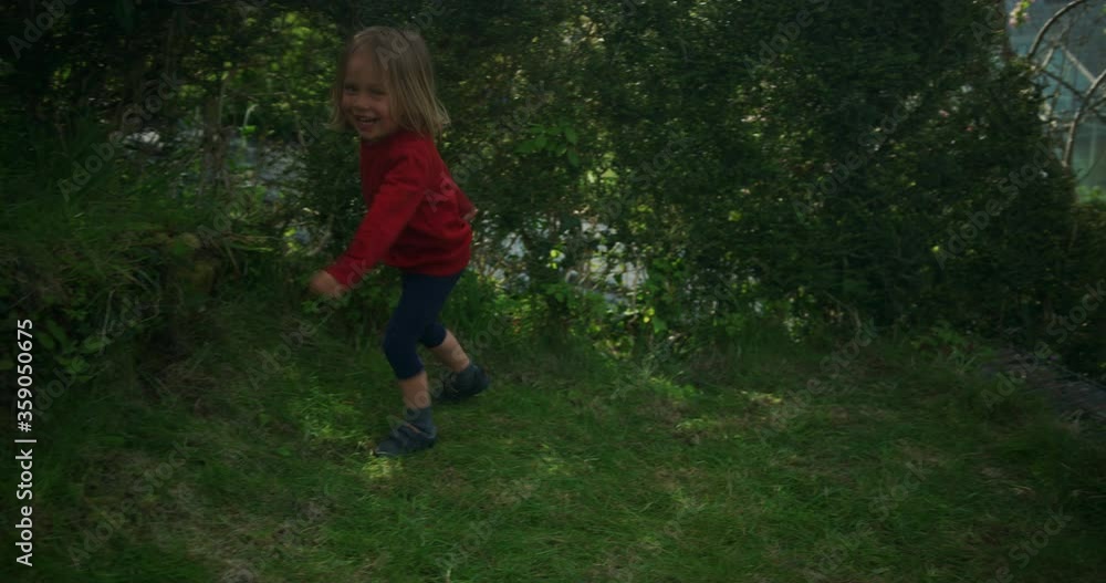 Little boy running and playing on the lawn Little boy running and playing on the lawn