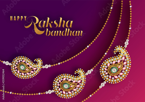 Decorated rakhi for Indian festival Raksha Bandhan Greeting Card ,indian festival with gold patterned and crystals on paper color Background.