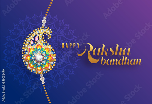 Decorated rakhi for Indian festival Raksha Bandhan Greeting Card ,indian festival with gold patterned and crystals on paper color Background.
