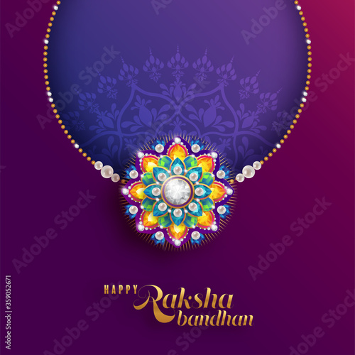 Decorated rakhi for Indian festival Raksha Bandhan Greeting Card ,indian festival with gold patterned and crystals on paper color Background.