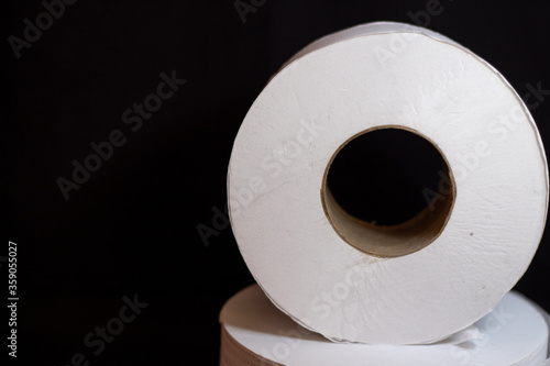 toilet paper roll on background black
