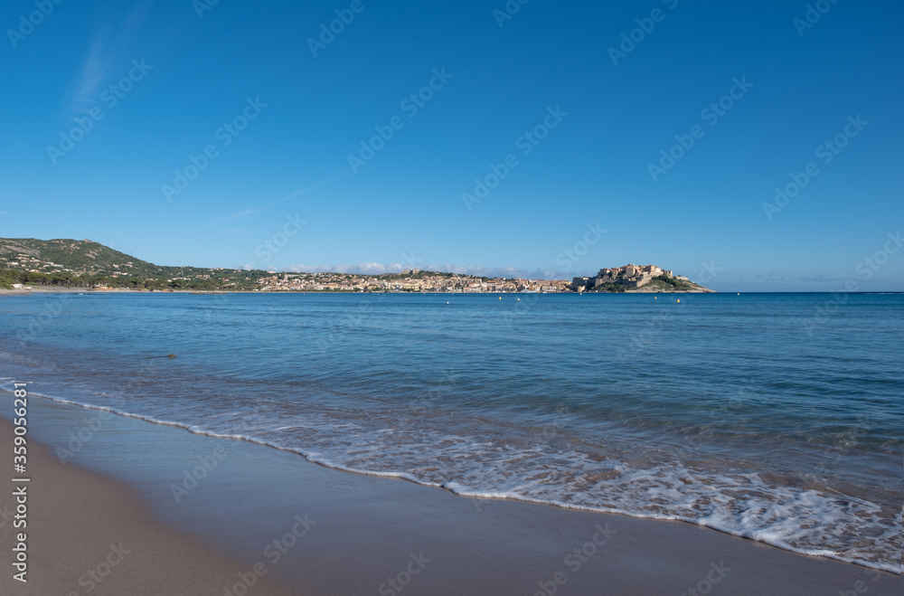 Calvi beach and citadel in Corsica