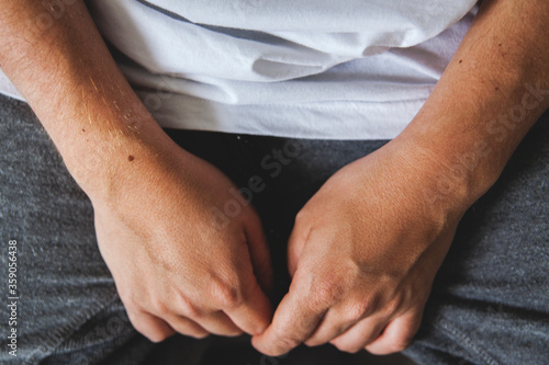 young man's hands