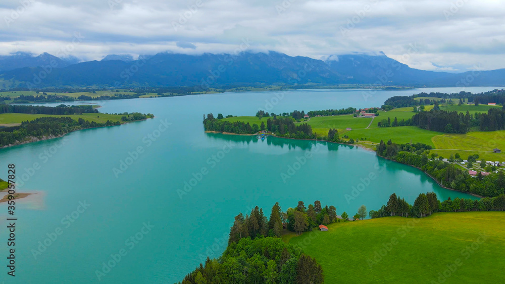 Aerial view over Lake Forggensee at the city of Fuessen in Bavaria Germany Aerial view over Lake Forggensee at the city of Fuessen in Bavaria Germany