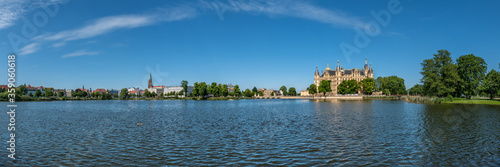 Schwerin  Germany. Panoramic view of the city with the Schwerin Castle  German  Schweriner Schlo     officially founded in 1160 with multiple restorations until 1857.