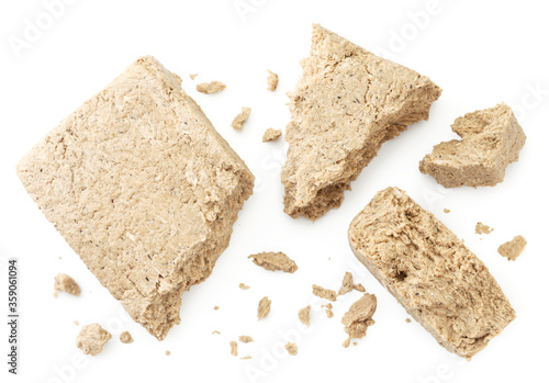 Pieces of halva on a white background, isolated. The view from top photo