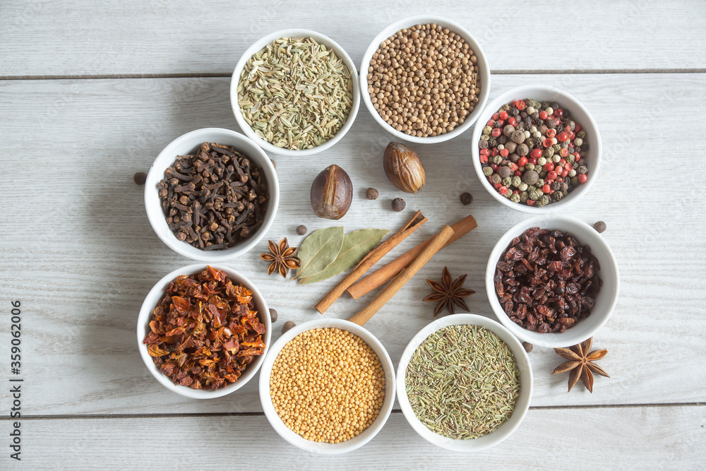 Dry seasonings and spices against a dark background view from the top.