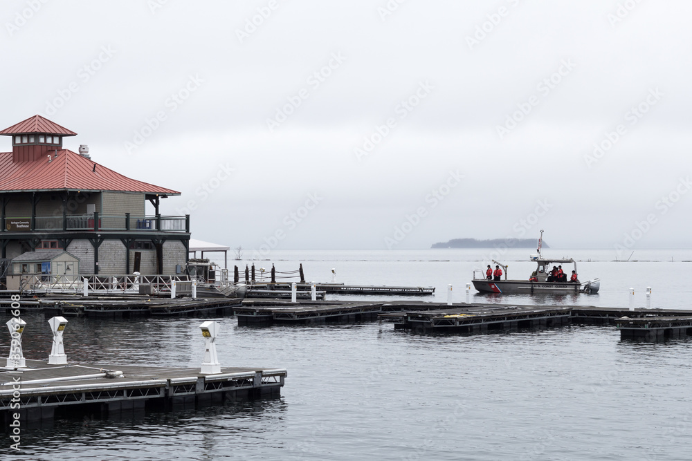 Dock on Lake Champlain in the city of Burlington, Vermont, with coast guard.