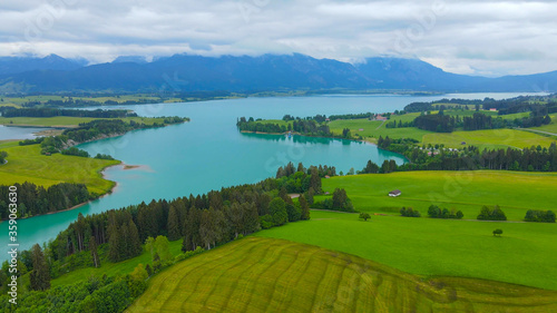 Aerial view over Lake Forggensee at the city of Fuessen in Bavaria Germany