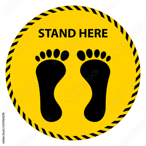 Black footprint and wording stand here on yellow-black tape sign.Social distancing concept for preventing corona virus covid-19. Vector illustration.